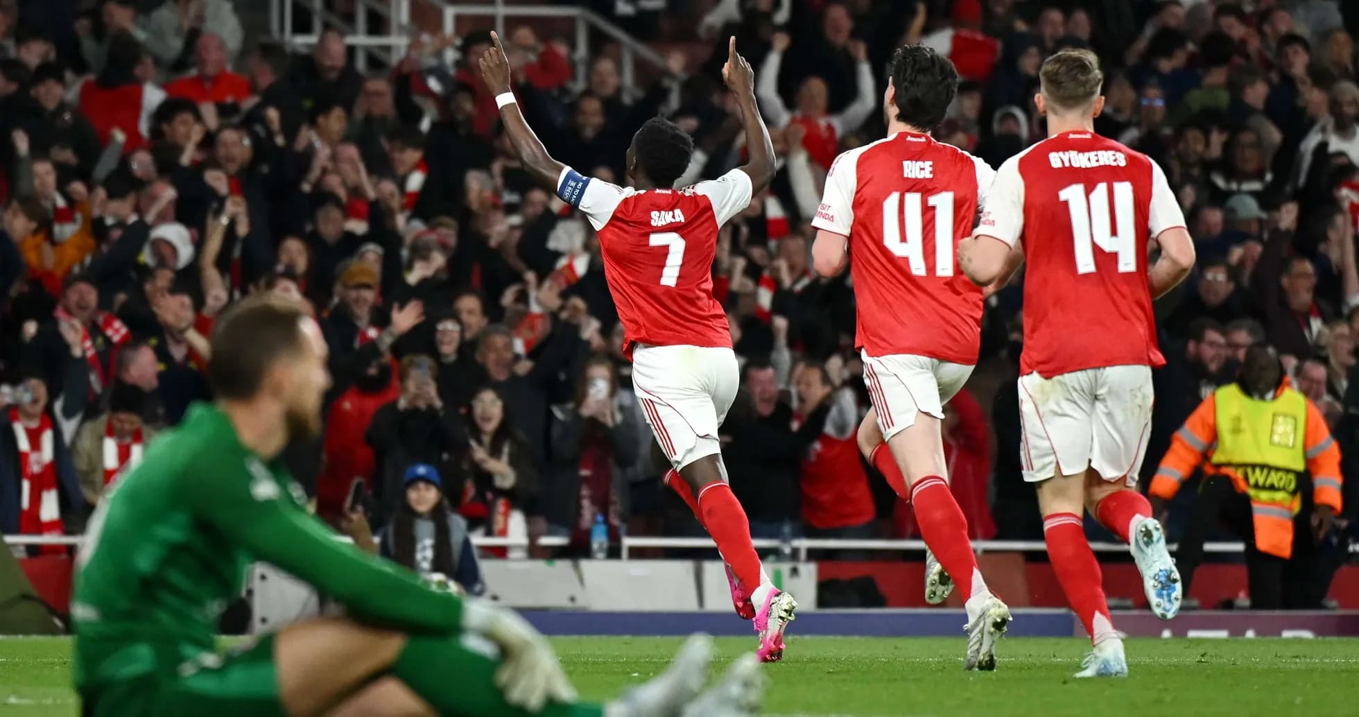 Arsenal players celebrating a goal during match
