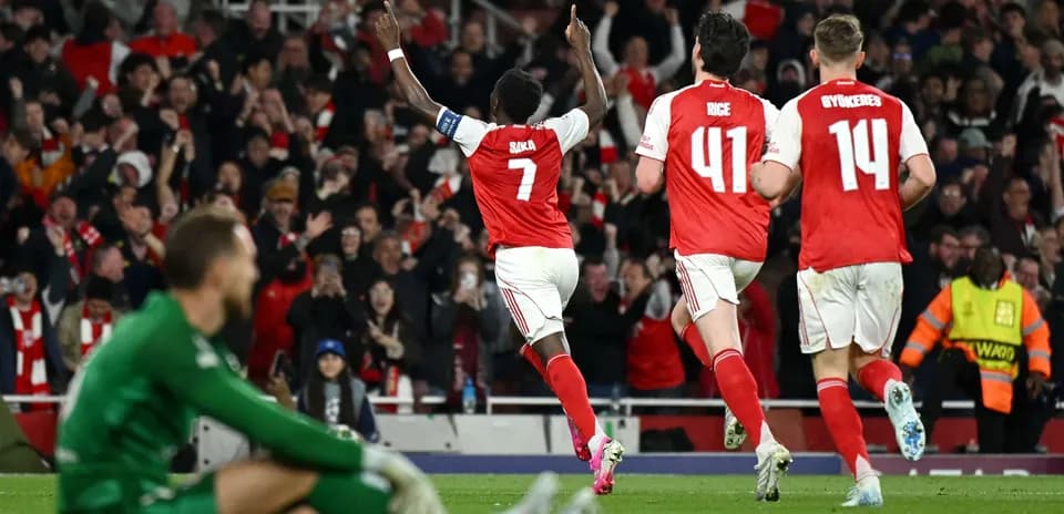 Arsenal players celebrating a goal during match