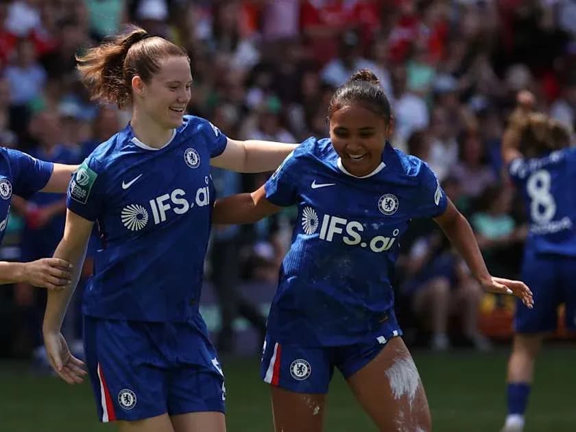 Chelsea players celebrating together on the field