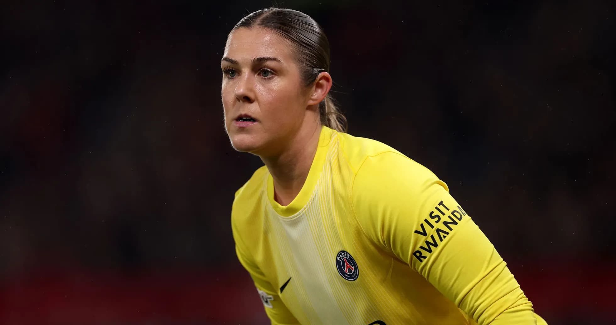 Goalkeeper in yellow kit during match action