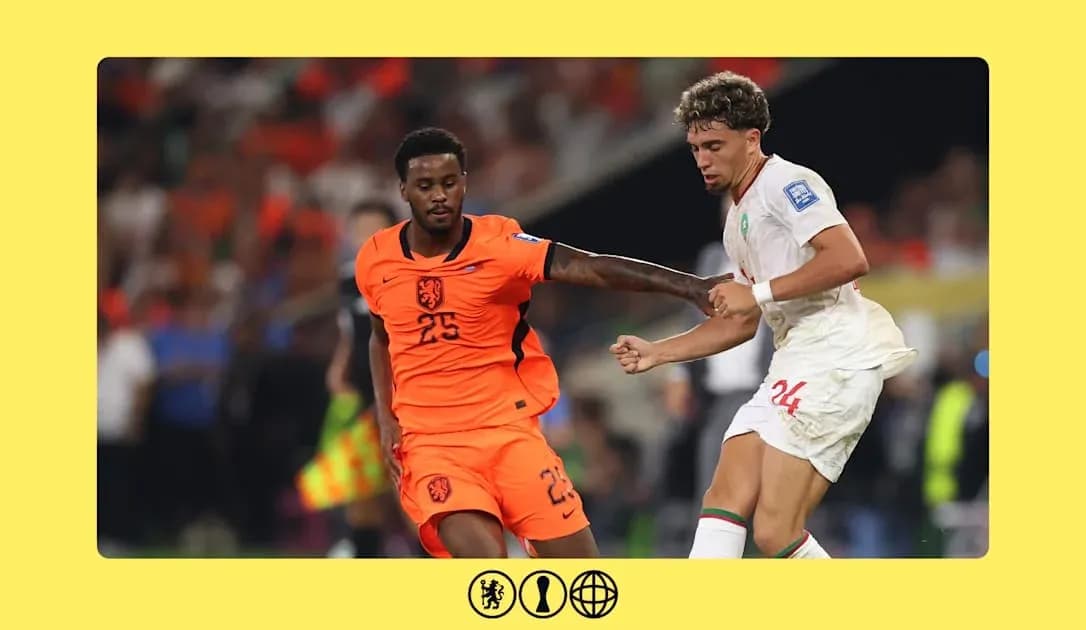 Players from Netherlands and Morocco contesting for the ball