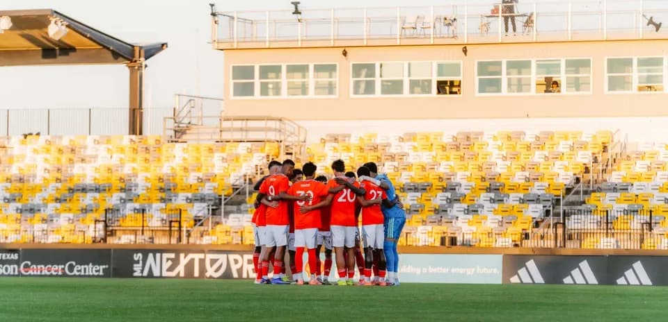 Houston Dynamo FC II players in pre-match huddle