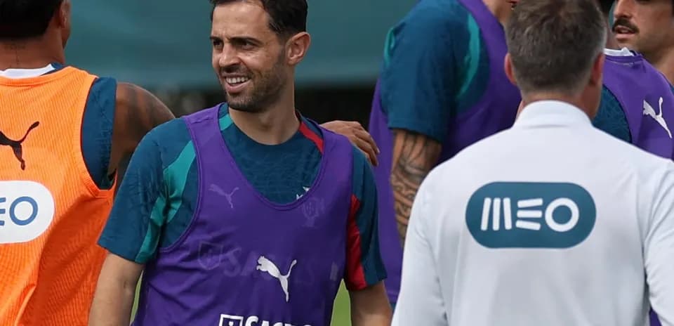 Players interacting during training session on field