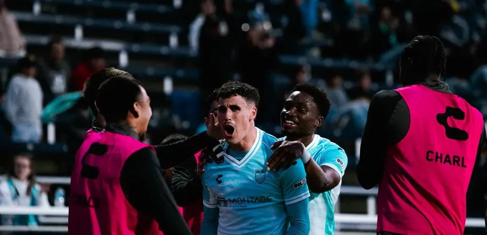 Monterey Bay players celebrating a goal
