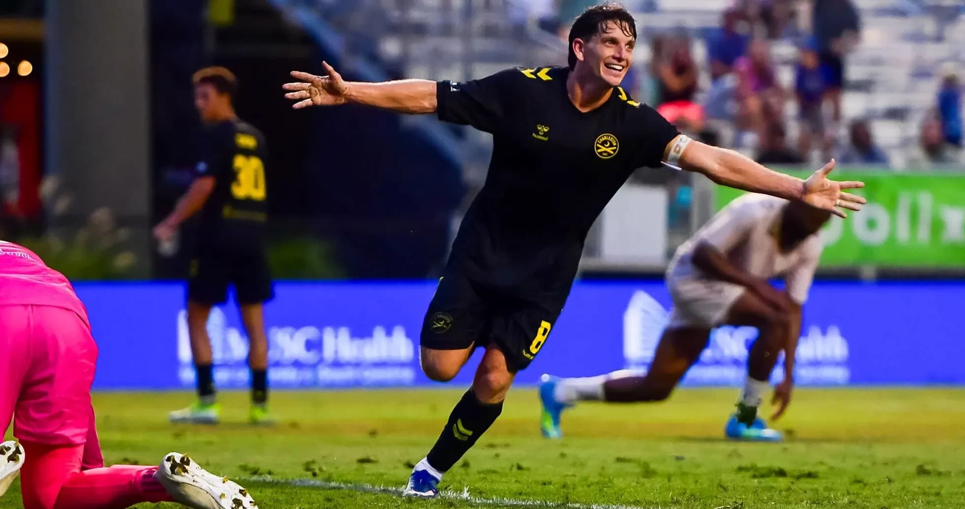 Player celebrating goal against FC Tulsa