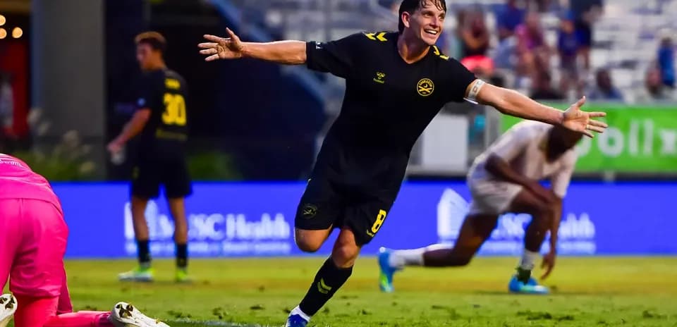 Player celebrating goal against FC Tulsa
