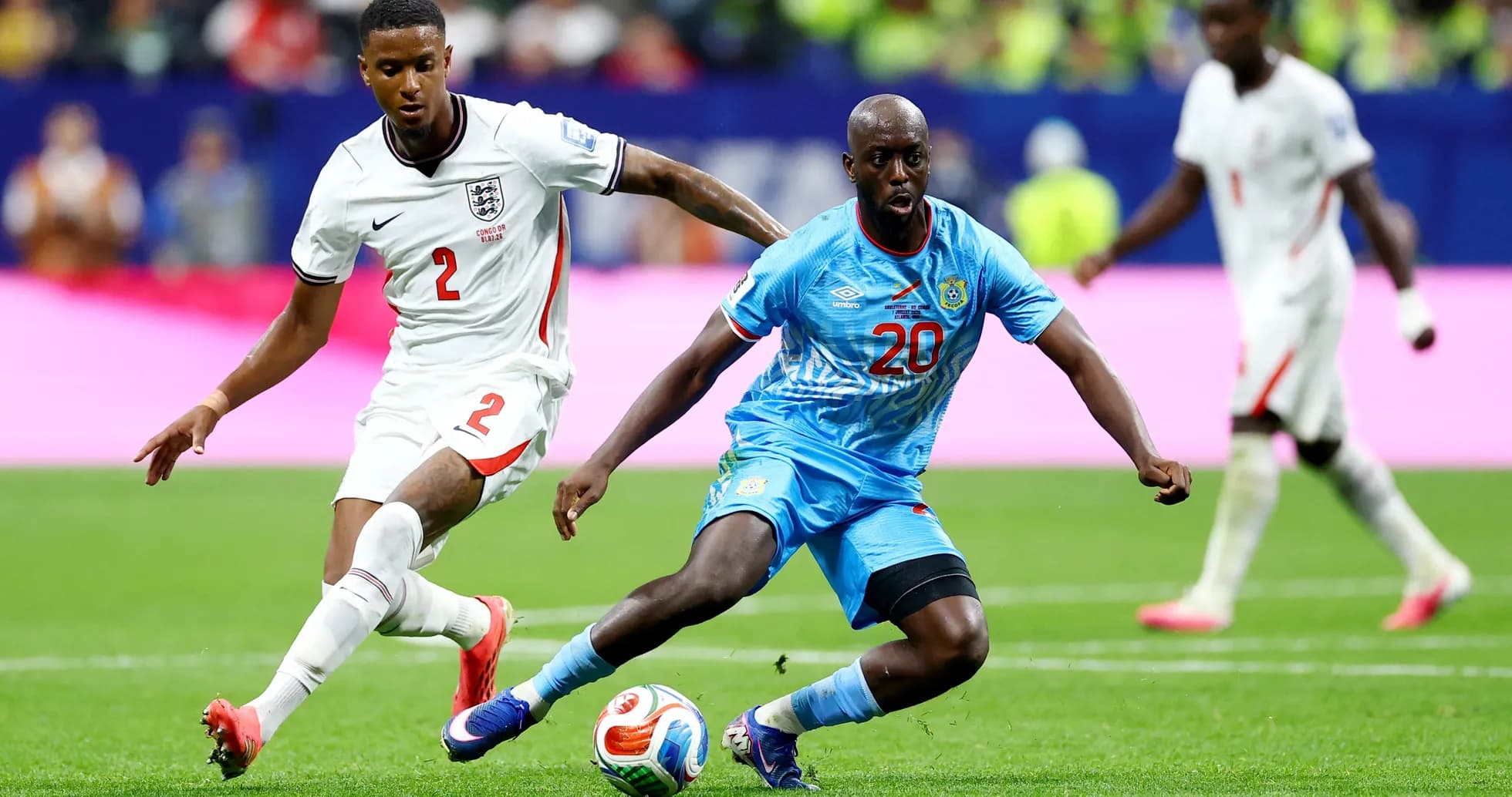 England and Congo DR players competing for the ball