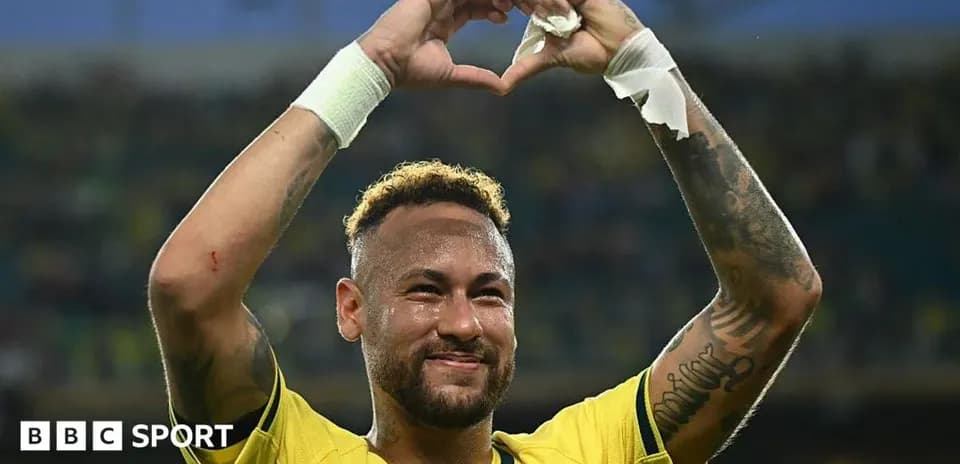 Player celebrating by making a heart gesture