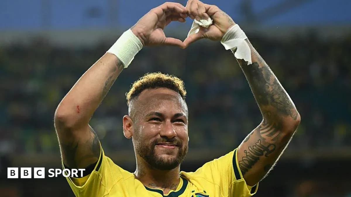 Player celebrating by making a heart gesture