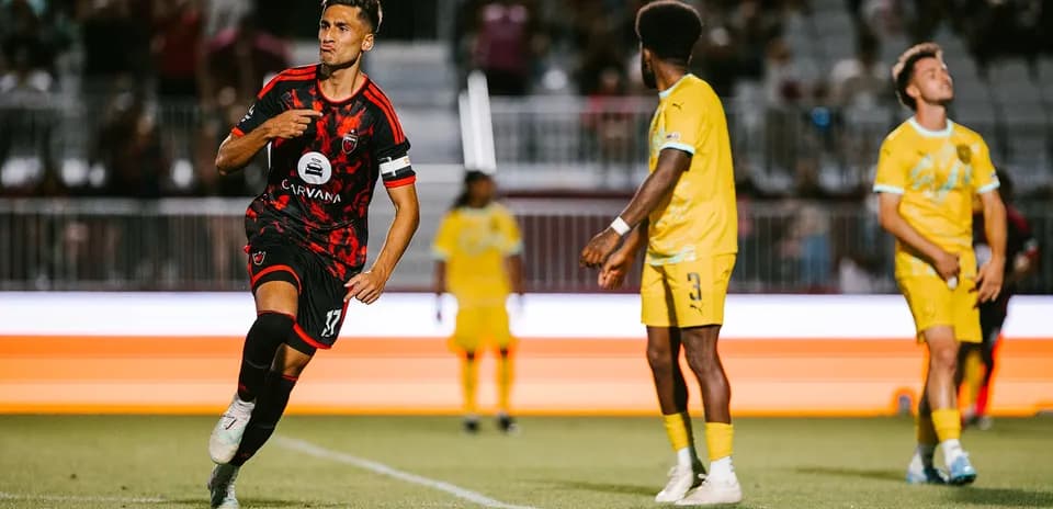 Player celebrating goal during New Mexico United match