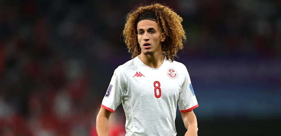 Tunisian player in action during match
