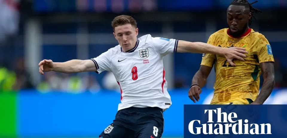 England player challenges Ghana player during match