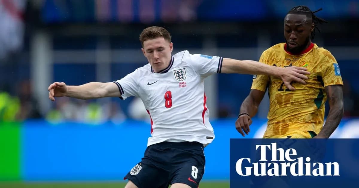 England player challenges Ghana player during match