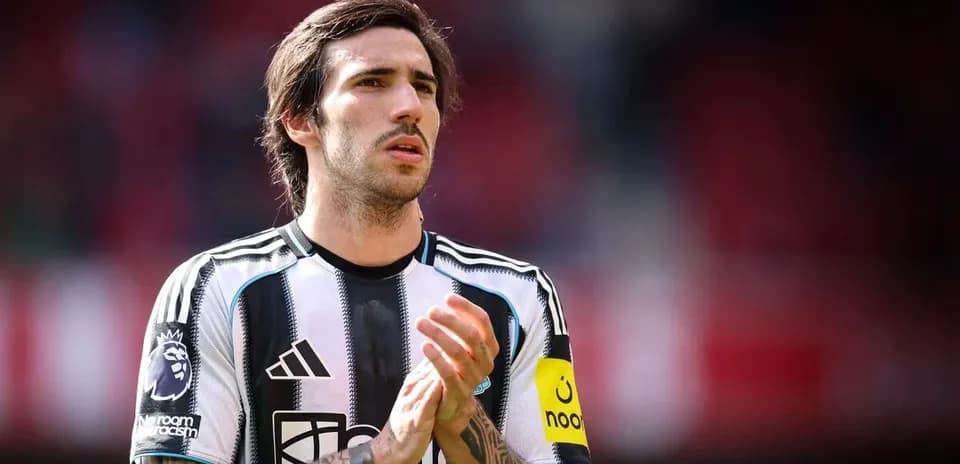 Player wearing Newcastle United jersey on the field