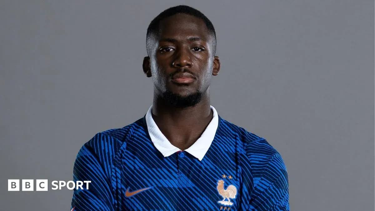 Football player wearing France national team jersey