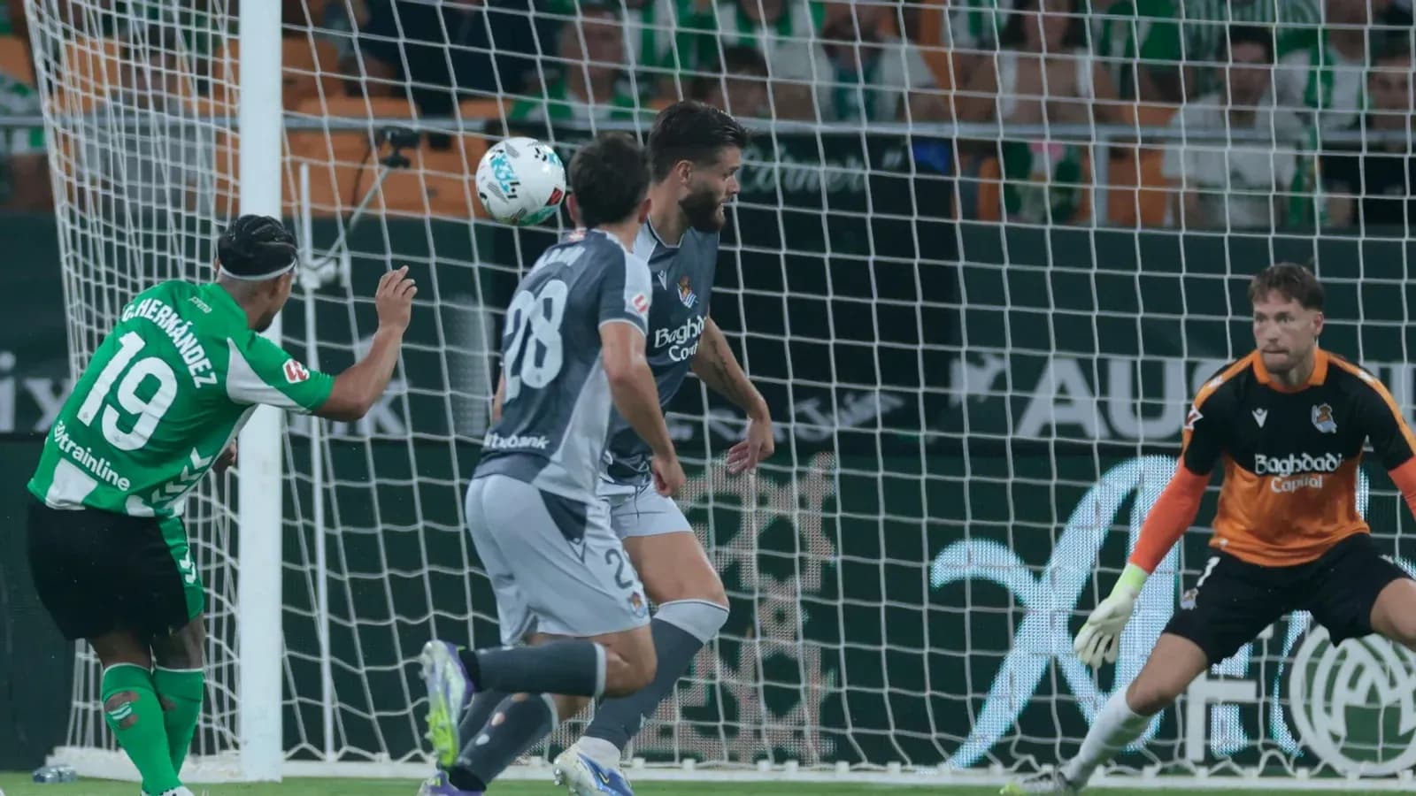Goalkeeper preparing to save shot during match