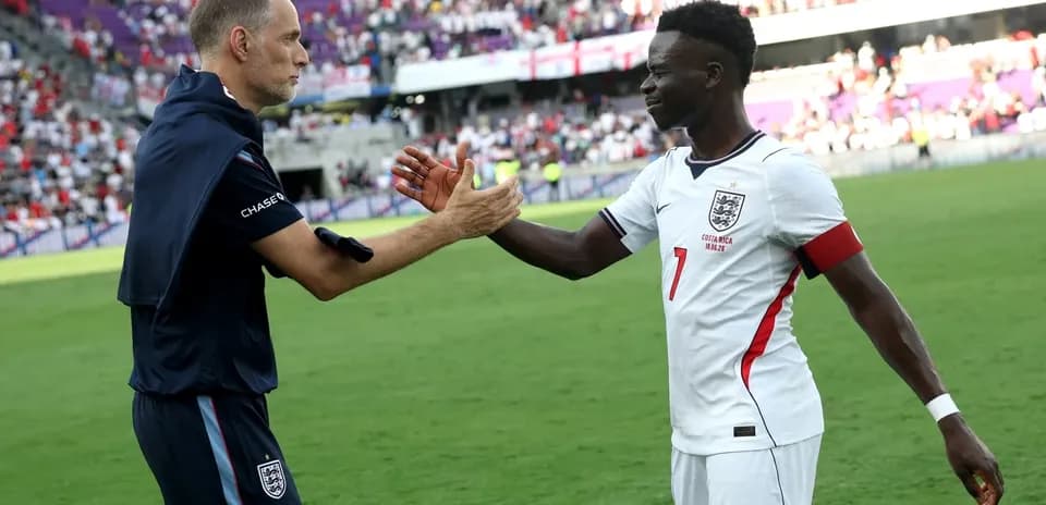 Coach and player shaking hands after match