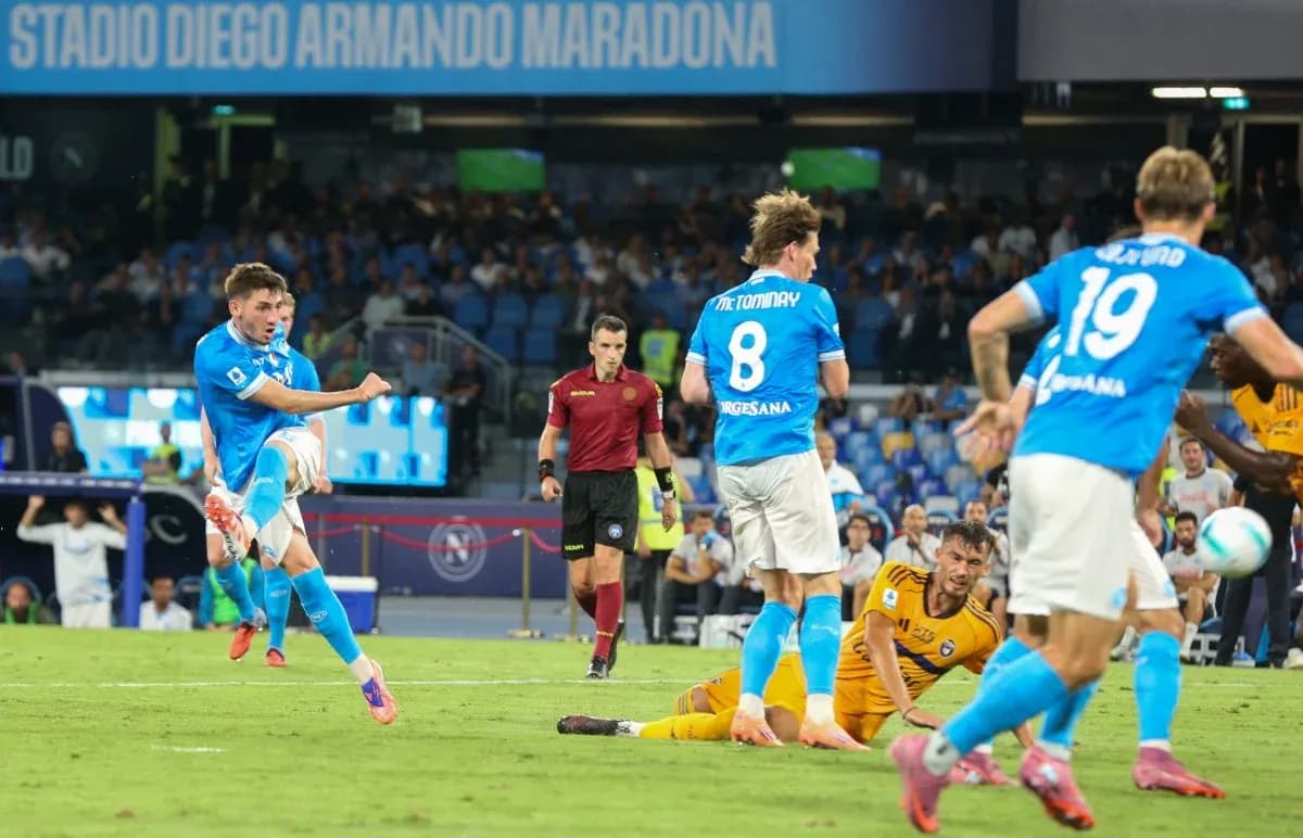 Napoli player taking a shot on goal
