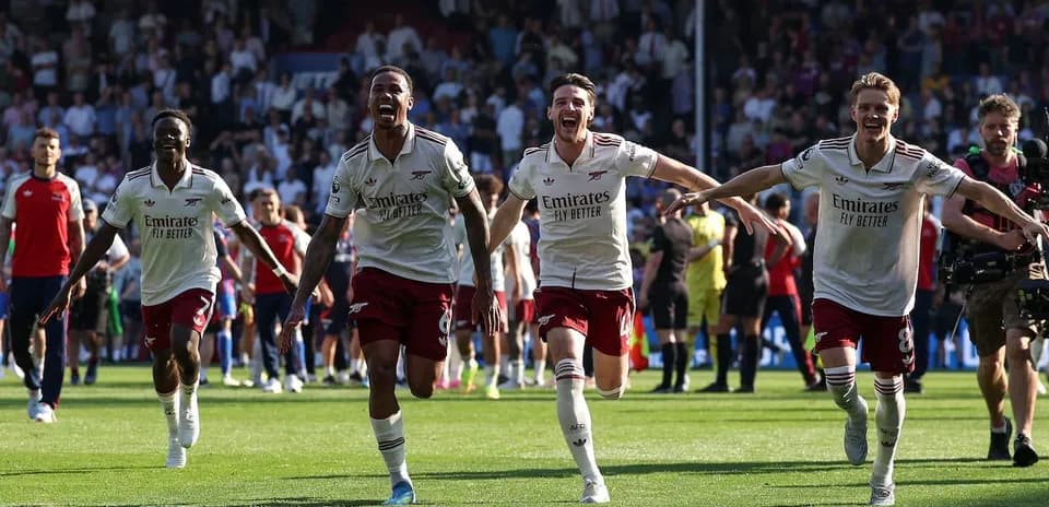 Arsenal players celebrating a goal during match