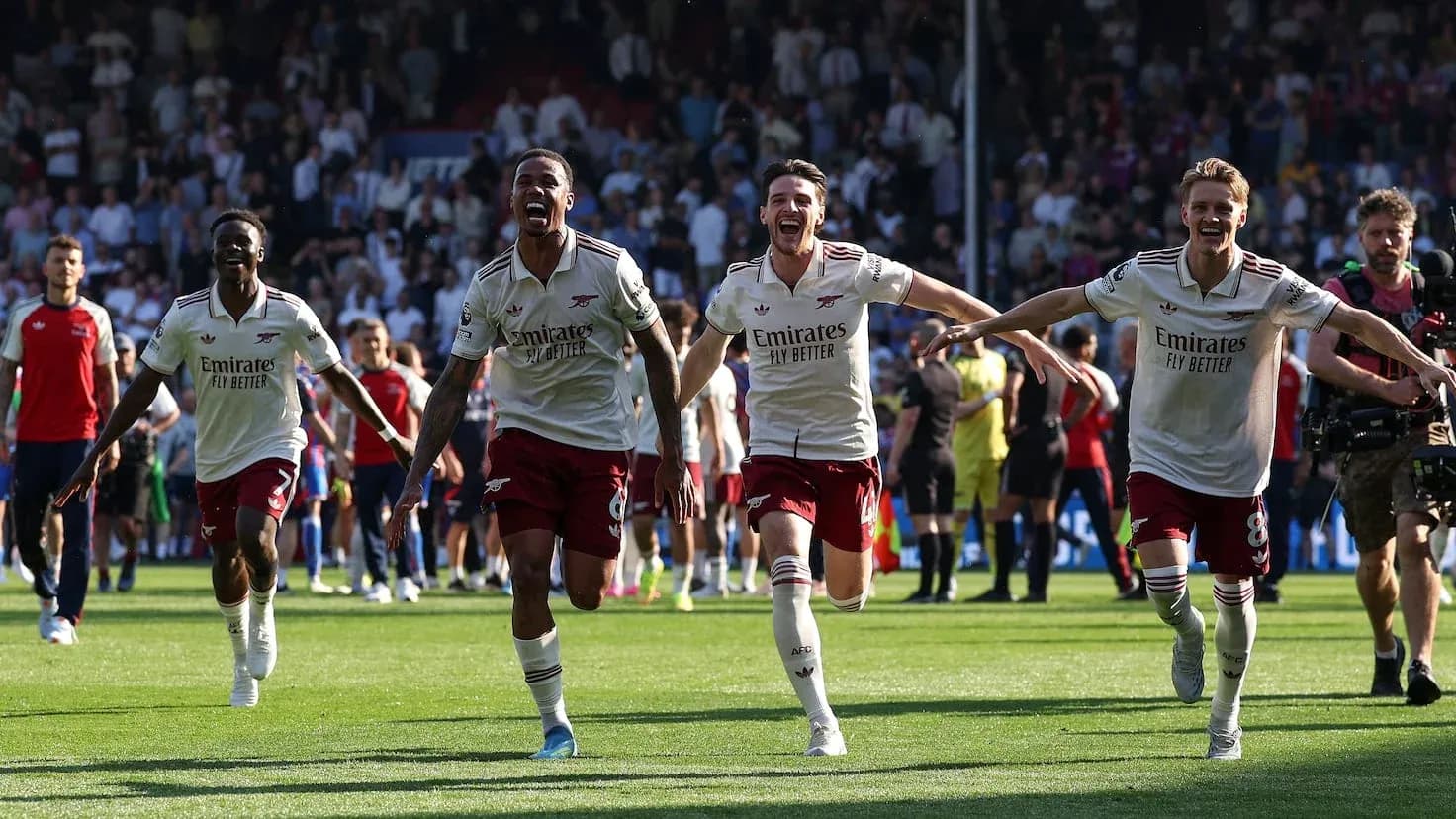 Arsenal players celebrating a goal during match