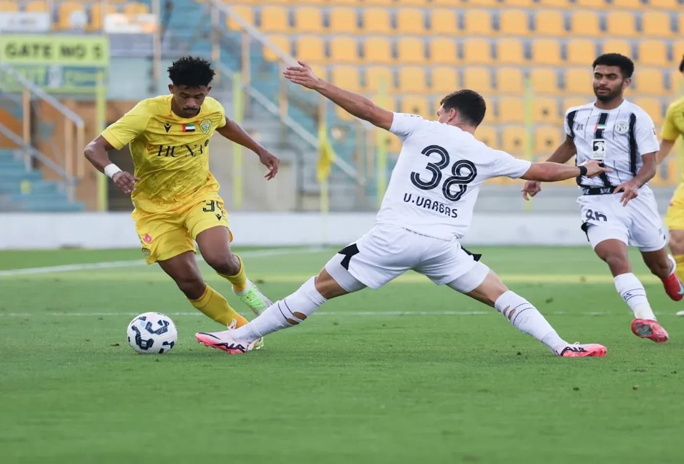 Player dribbling during Al Wasl U23 match