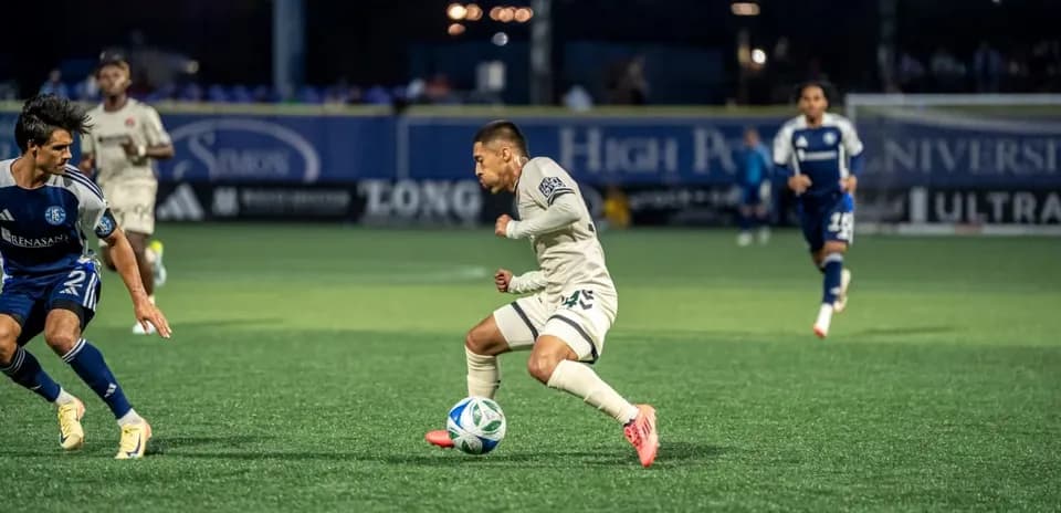 Player dribbling the ball during match