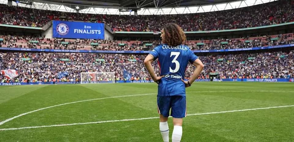 Player wearing Chelsea kit at Wembley Stadium