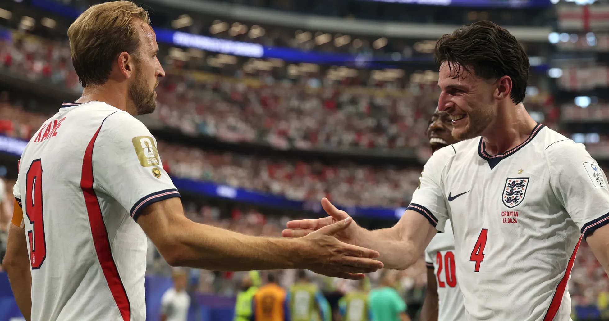 Players celebrating with handshake during match