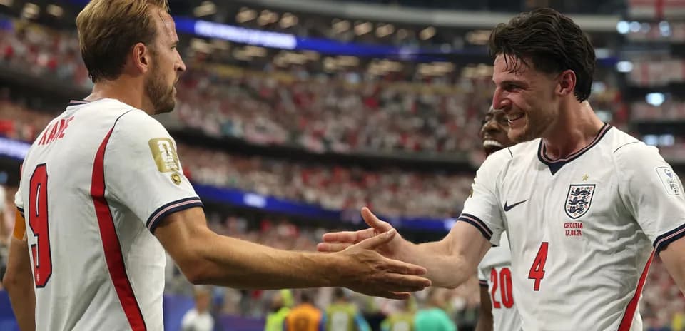 Players celebrating with handshake during match
