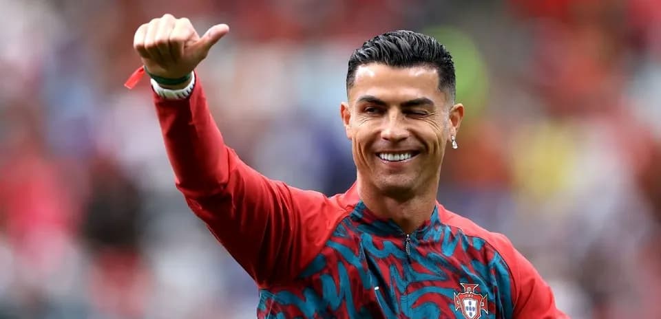 Cristiano Ronaldo waving during warm-up session