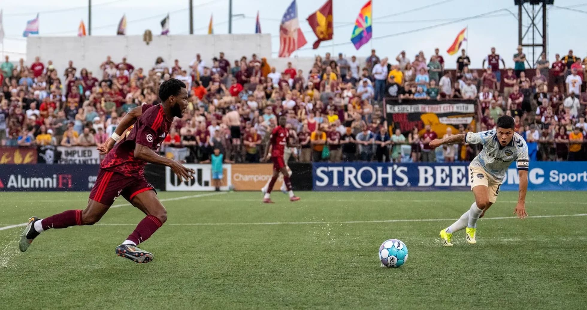 Players competing for the ball during match