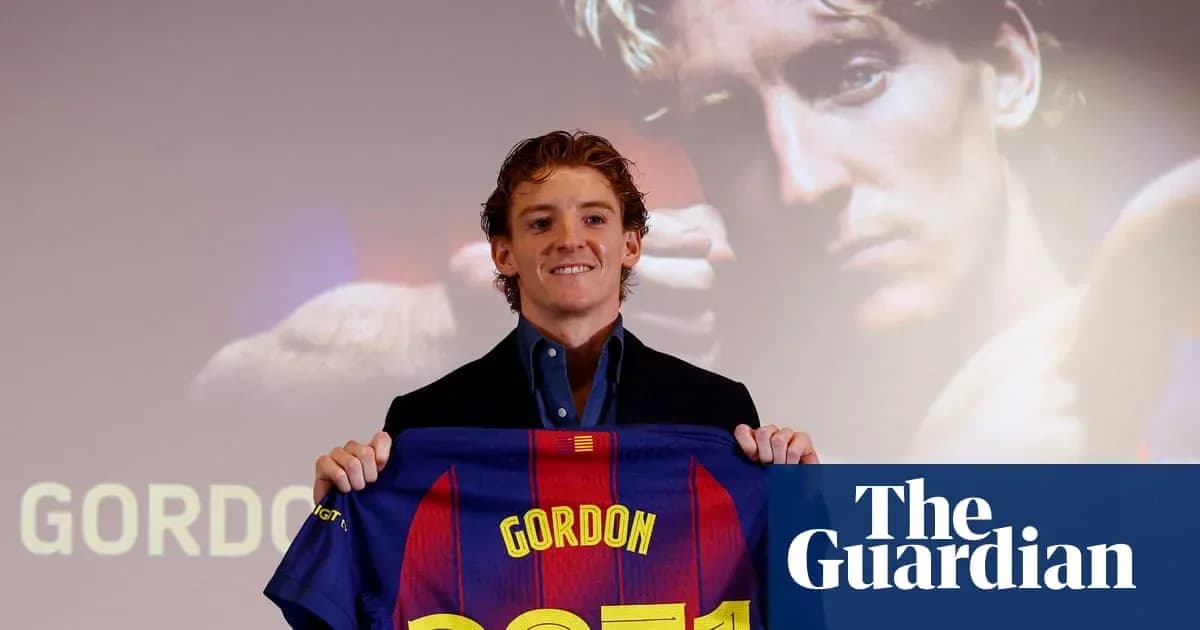 Player holding FC Barcelona jersey at presentation