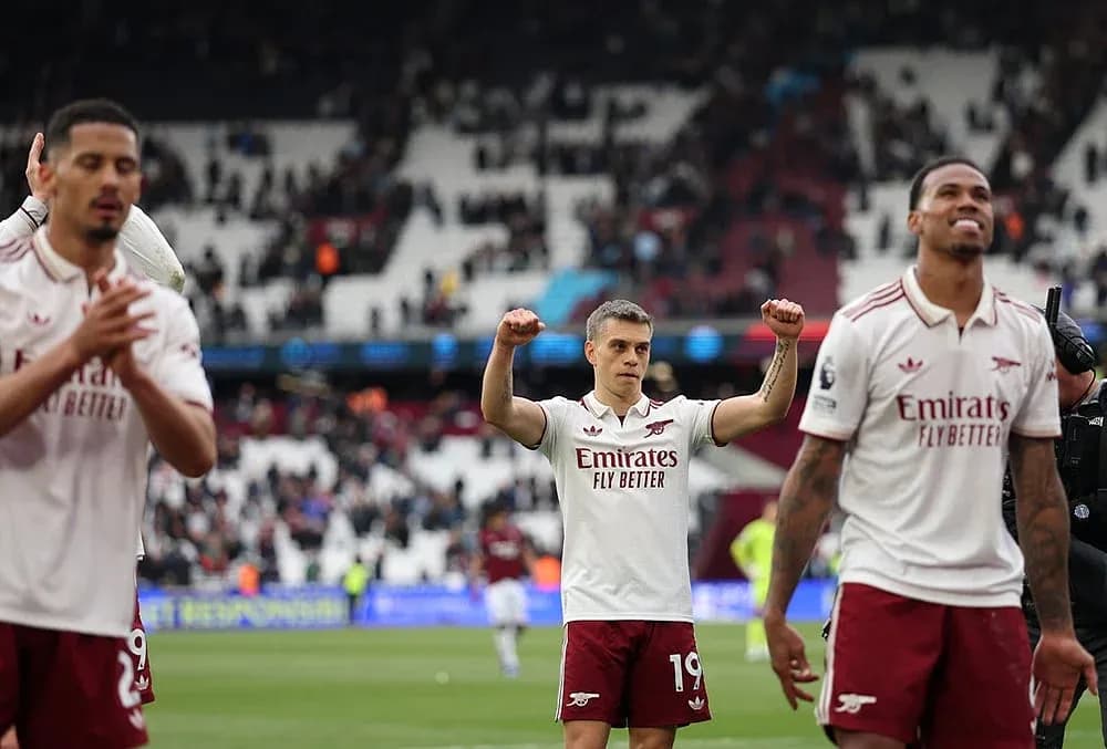 Arsenal players celebrating after Premier League match