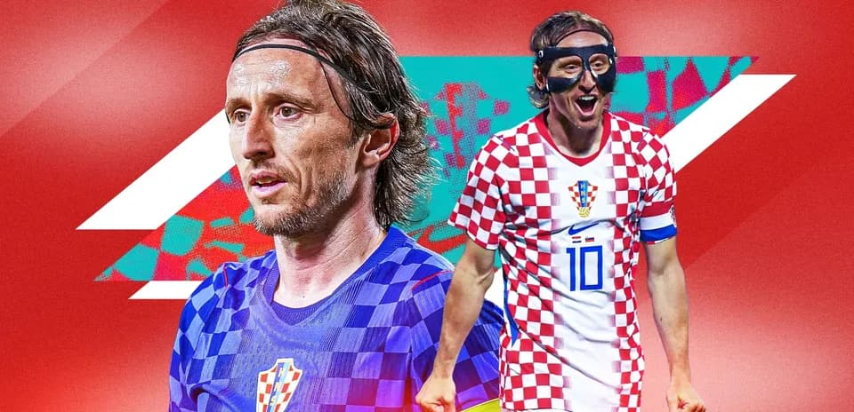 Luka Modrić in Croatian kit, celebrating a goal