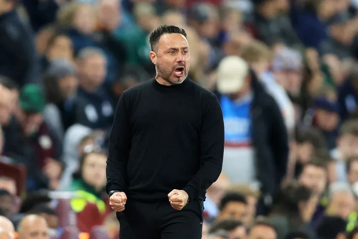 Manager celebrating passionately on the sidelines