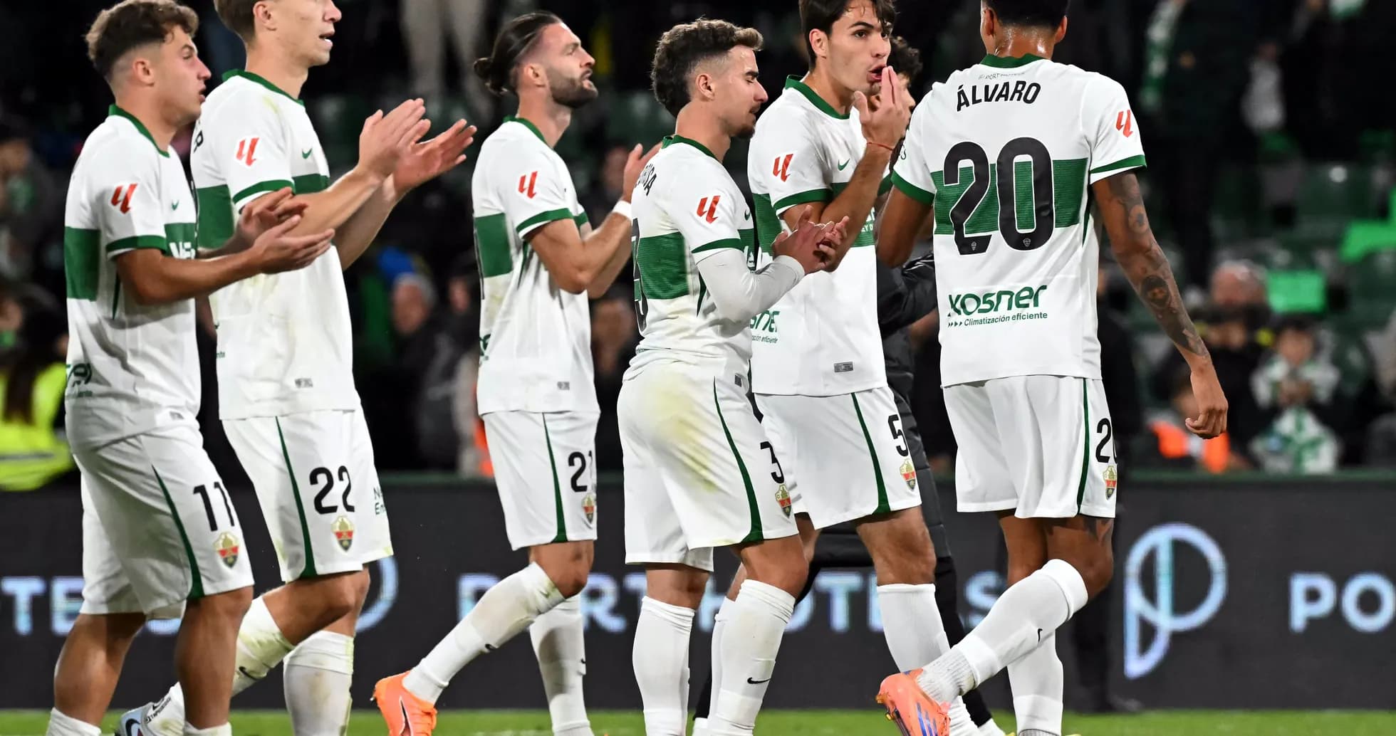 Elche players celebrating a goal during match
