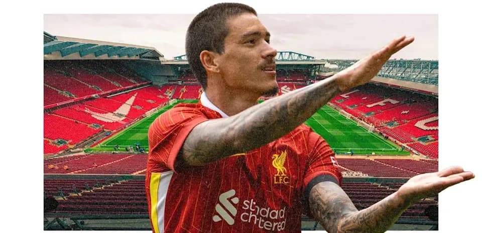 Player gesturing on the pitch at Anfield