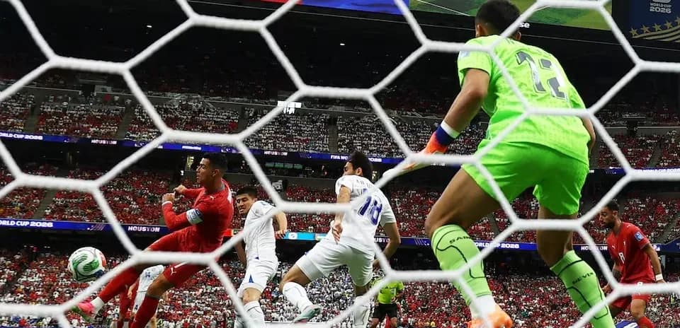 Goalkeeper preparing to save shot during match