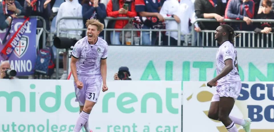 Players celebrating a goal during Cagliari vs Udinese match