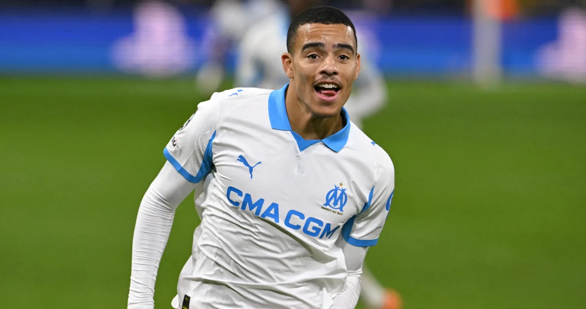 Player celebrating a goal in Marseille jersey