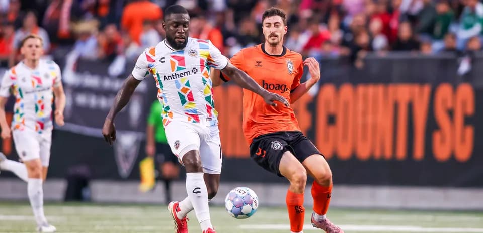 Players competing during Oakland Roots match