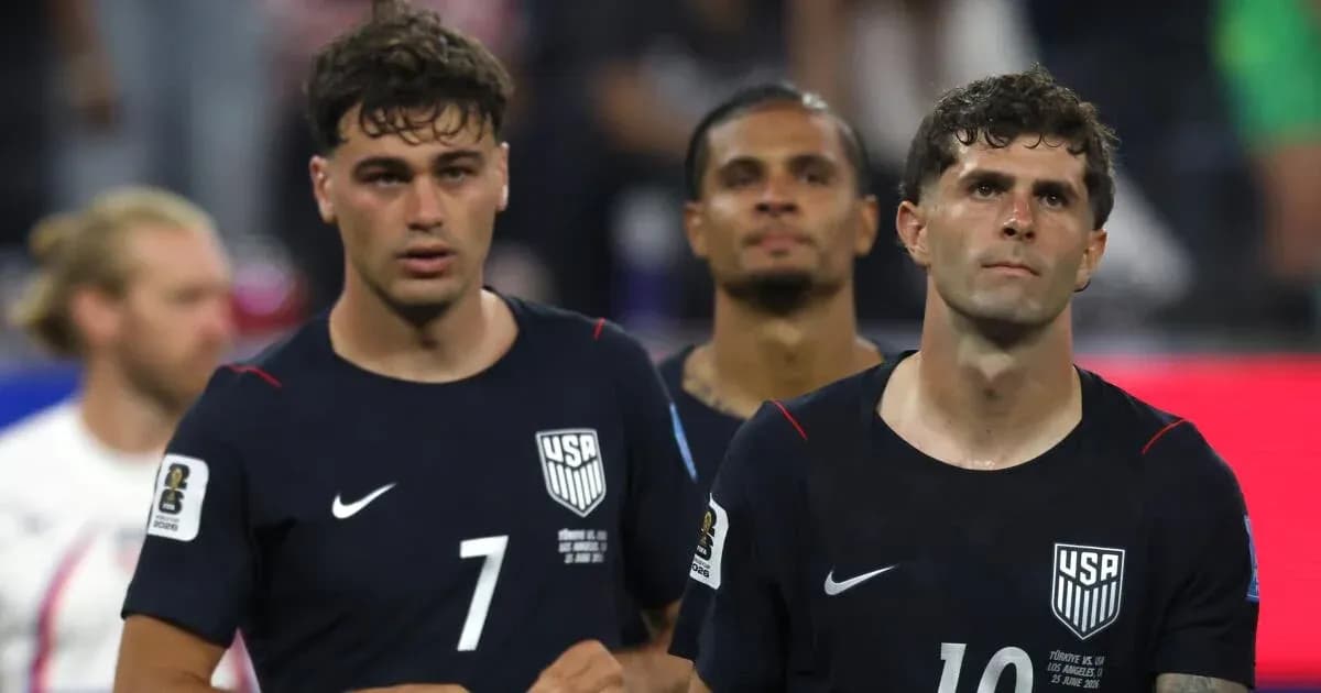 US men's soccer players walking off the field