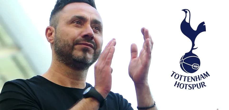 Man clapping with Tottenham Hotspur logo in background