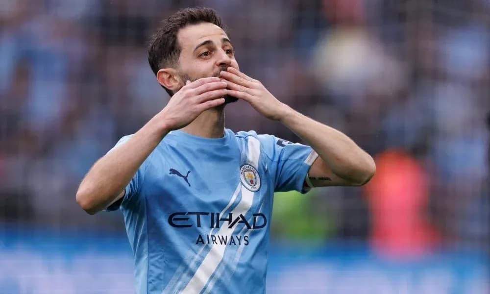 Player celebrating after scoring a goal for Manchester City
