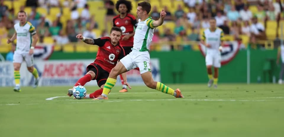 Tampa Bay Rowdies player tackles Hartford Athletic opponent
