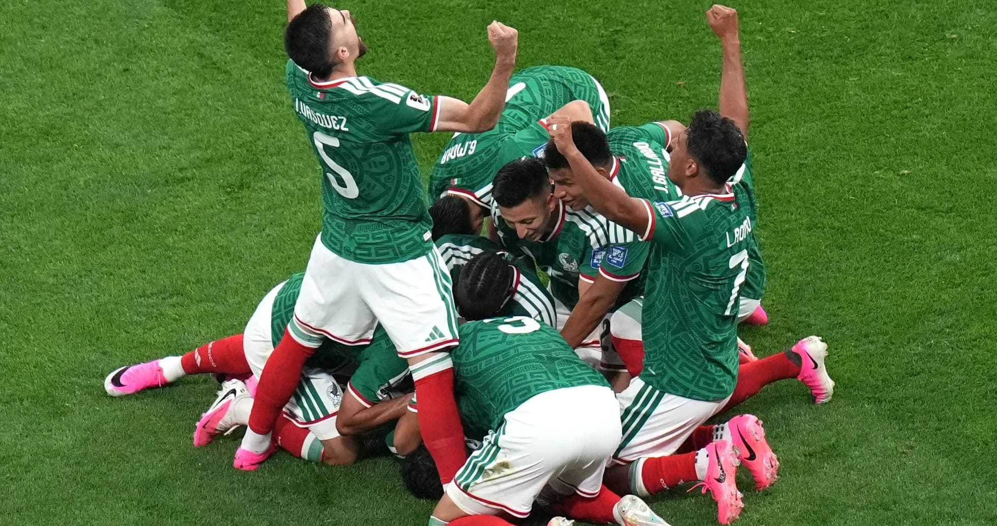 Mexico players celebrating a goal in match Mexico players celebrating a goal in match