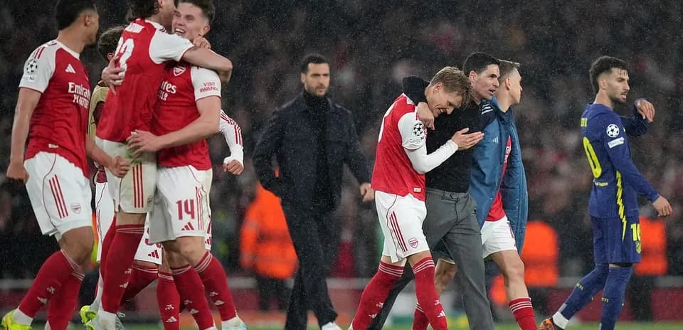 Arsenal players celebrating after UEFA match Arsenal players celebrating after UEFA match