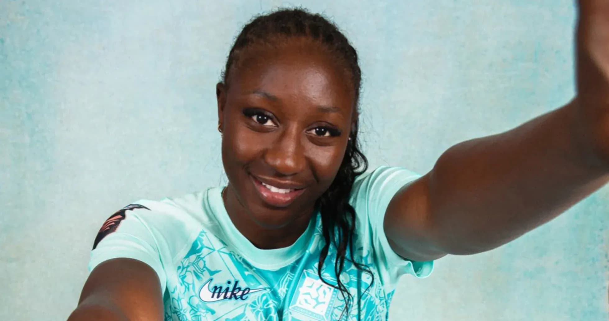 Athlete posing for a selfie in sports attire Athlete posing for a selfie in sports attire