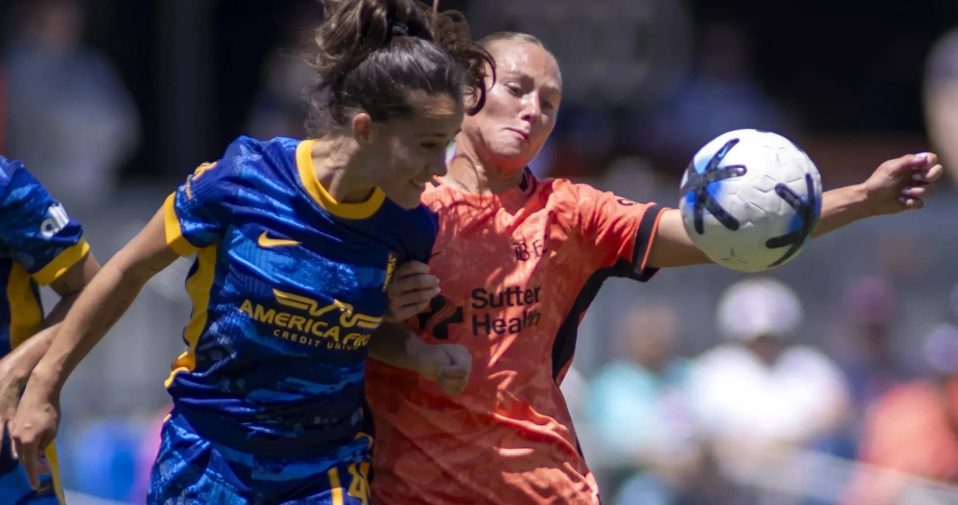 Bay FC player challenging Utah Royals goalkeeper Bay FC player challenging Utah Royals goalkeeper