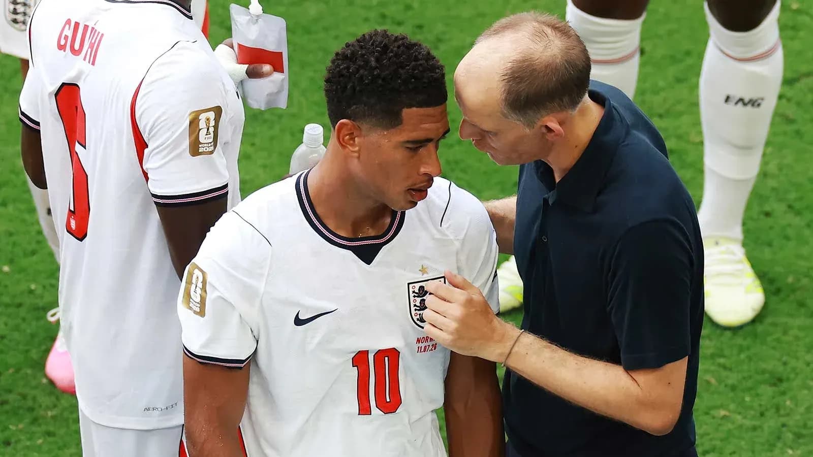 Player receiving guidance from coach during match Player receiving guidance from coach during match